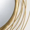 Gold metal finish detail of MORii Whirlpool wall mirror