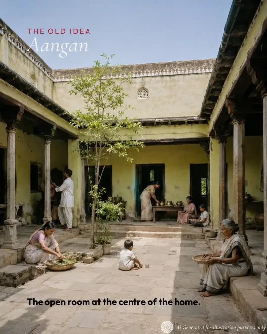 Traditional Indian courtyard home with a shaded central aangan used for everyday family activities.